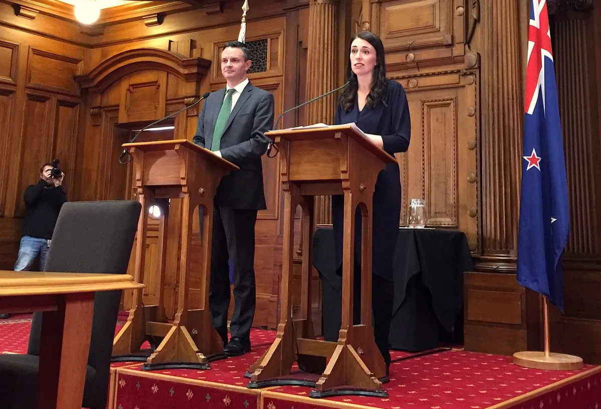 Former New Zealand Prime Minister Jacinda Ardern speaks as she stands next to outgoing New Zealand Green Party leader James Shaw in Wellington, New Zealand, Oct. 24, 2017. (REUTERS/Nicolaci da Costa)