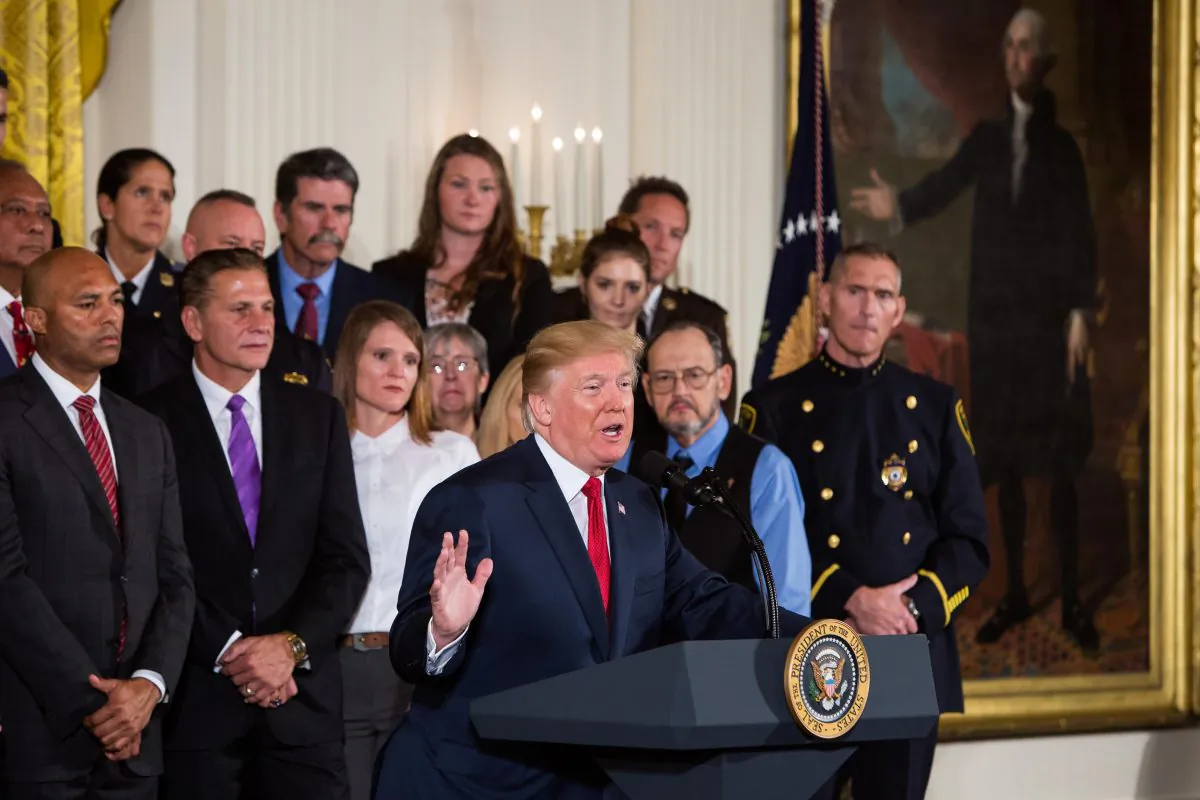 President Donald Trump officially declares the opioid crisis a nationwide public health emergency in the East Room of the White House in Washington on Oct. 26, 2017. (Samira Bouaou/The Epoch Times)