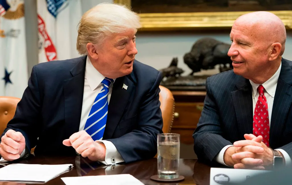 US President Donald Trump speaks with Rep. Kevin Brady (R), chairman of the House Committee on Ways and Means, during a meeting with members of the Committee in the White House in Washington, DC on Sept. 26, 2017. (SAUL LOEB/AFP/Getty Images)