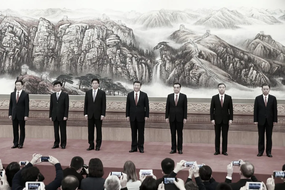 (L to R) Han Zheng, Wang Huning, Li Zhanshu, Xi Jinping, Li Keqiang, Wang Yang, and Zhao Leji,  members of the Chinese Communist Party's Politburo Standing Committee, attends a news conference following the end of the 19th National Congress, at the Great Hall of the People in Beijing on October 25, 2017. (Lintao Zhang/Getty Images)