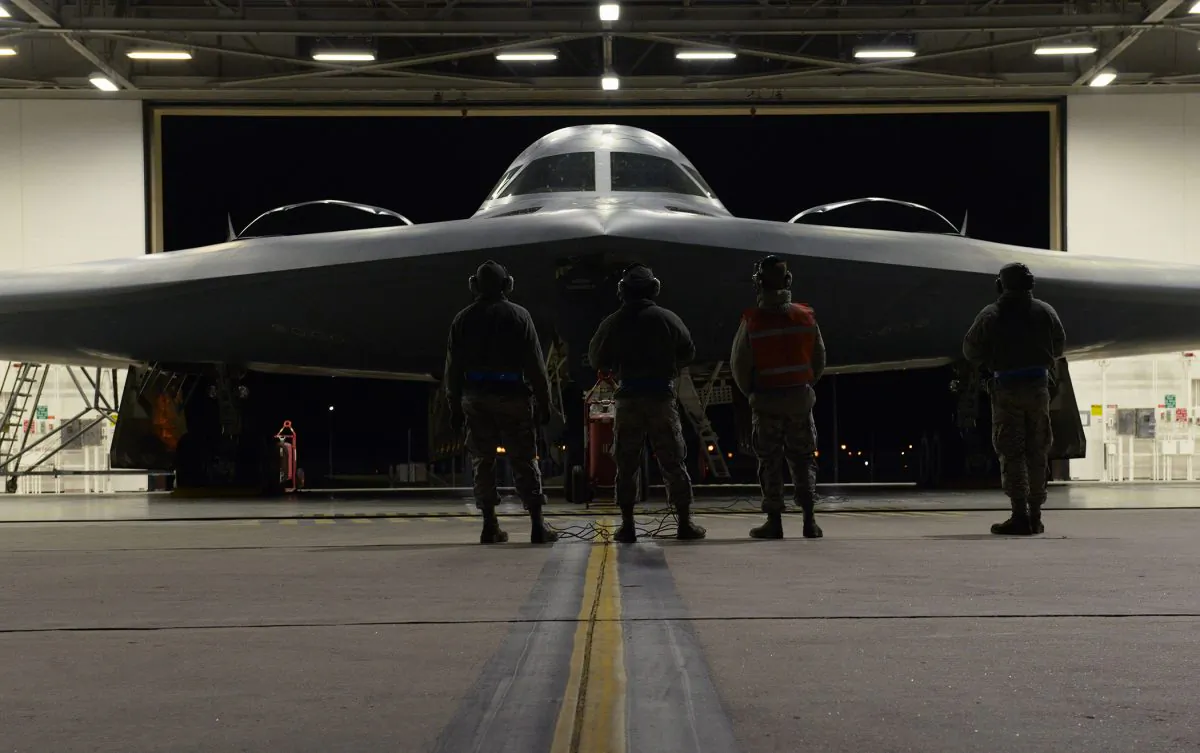 U.S. Air Force maintainers inspect a B-2 Spirit before it takes off from Whiteman Air Force Base, Mo. on Oct. 28, 2017. The B-2 conducted a long-range mission to the U.S. Pacific Command area of responsibility this weekend. (Airman 1st Class Taylor Phifer)