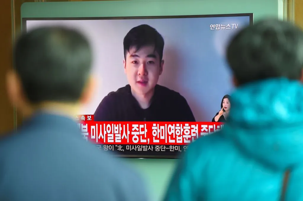 South Koreans watch a television news showing a video footage of a man who claims he is Kim Han-Sol, a nephew of North Korea's leader Kim Jong-Un, at a railway station in Seoul on March 8, 2017.
(Jung Yeon-Je/AFP/Getty Images)