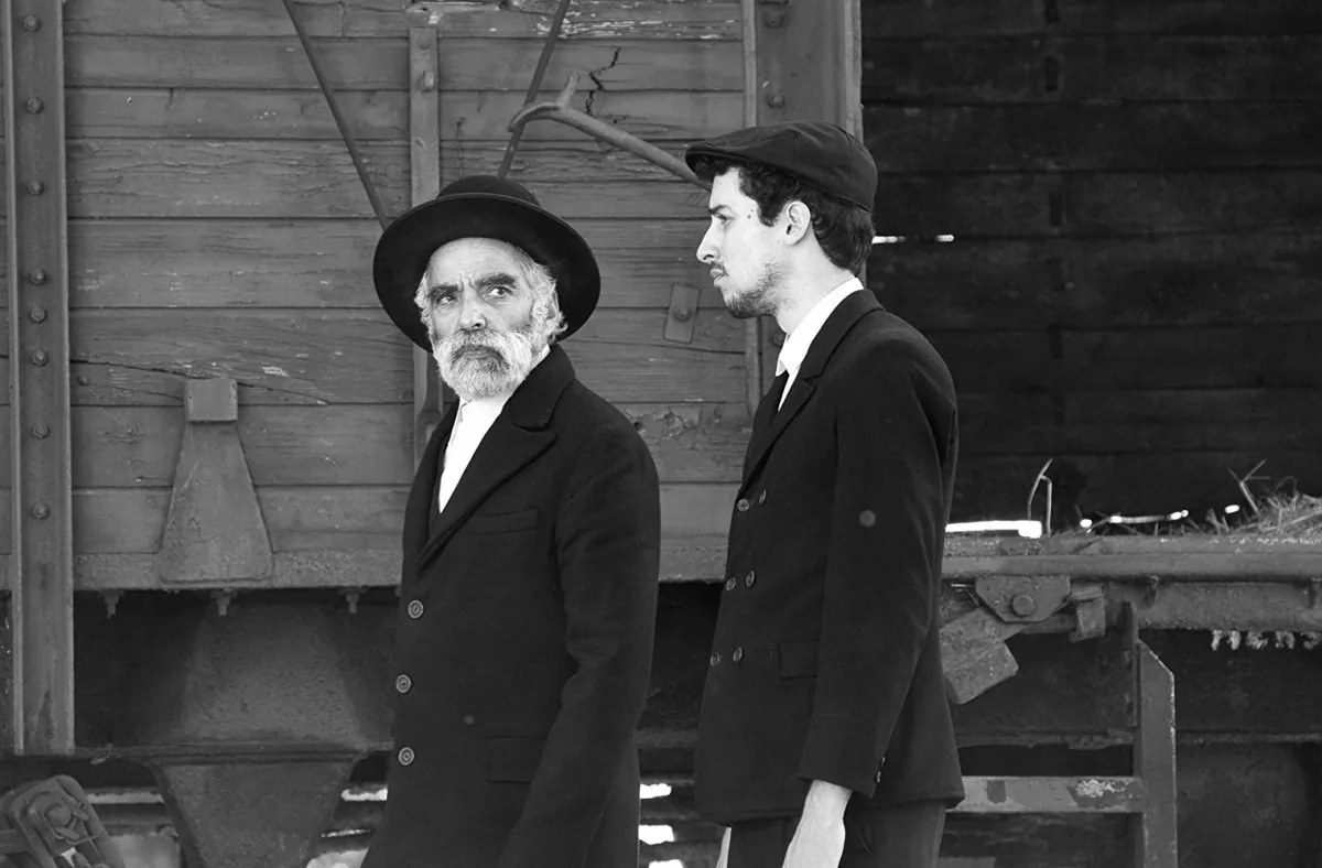 (L–R) Iván Angelus and Marcell Nagy play two Jews who appear in a Hungarian village one day after the end of WWII. They are carting two coffins. (Menemsha Films)