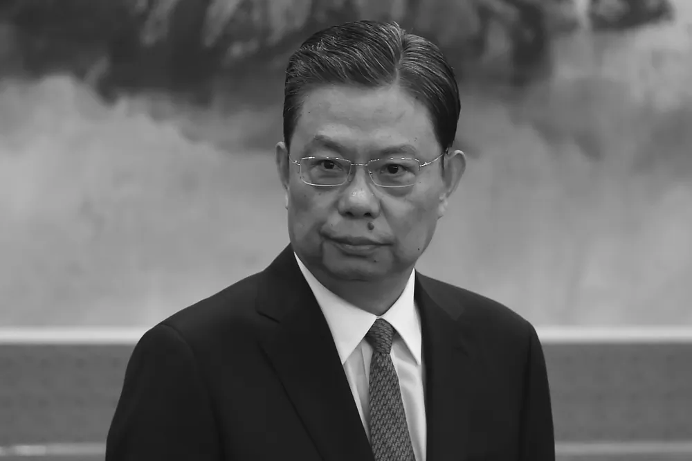 Zhao Leji, Secretary of the Central Commission for Discipline Inspection (CCDI), stands as he is introduced as a new member of the Communist Party of China's Politburo Standing Committee, in Beijing on Oct. 25, 2017. (Wang Zhao/AFP/Getty Images)