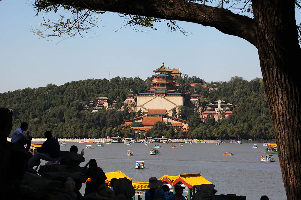 Tourists visit the Summer Palace in Beijing on Oct. 3, 2015. The Palace recently announced a plan to establish a “Party Representative Office.” (VCG/VCG/Getty Images)