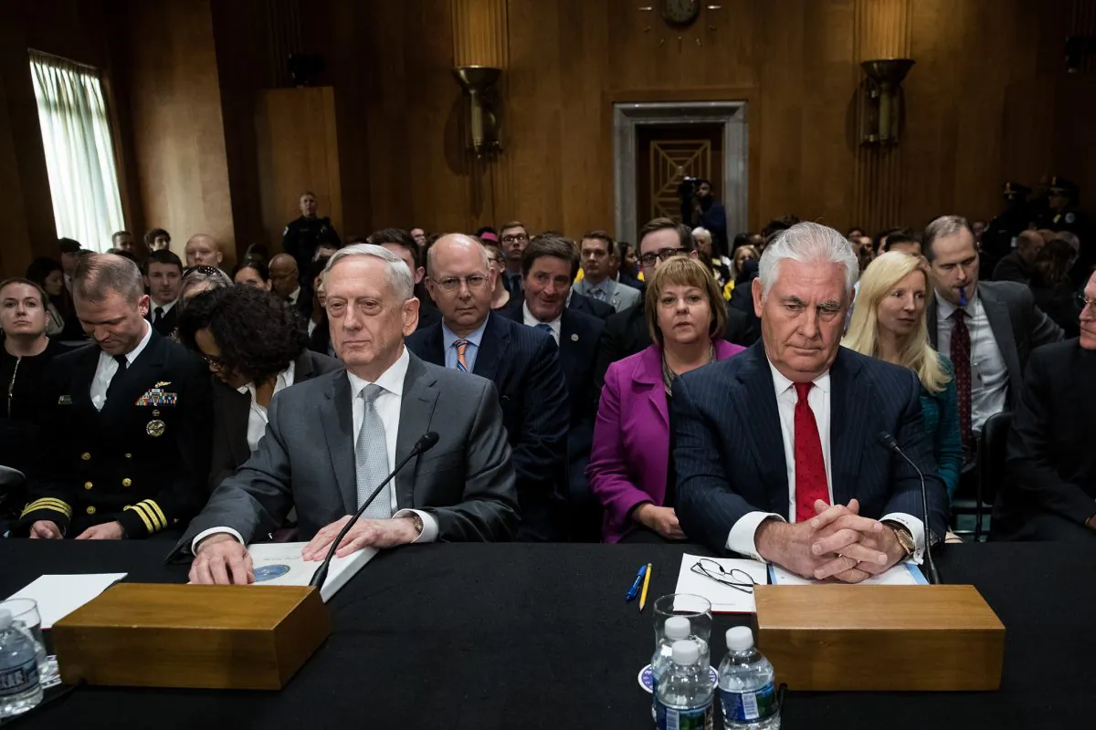 (L to R) U.S. Defense Secretary Gen. Jim Mattis and Secretary of State Rex Tillerson take their seats as they arrive for a Senate Foreign Relations Committee hearing concerning the authorization for use of military force, in Washington, D.C. on Oct. 30, 2017. As Mattis and Tillerson face questions about the administration's authority to use military force, Congress is still seeking more information about the deadly ambush that killed four U.S. troops in Niger. (Drew Angerer/Getty Images)