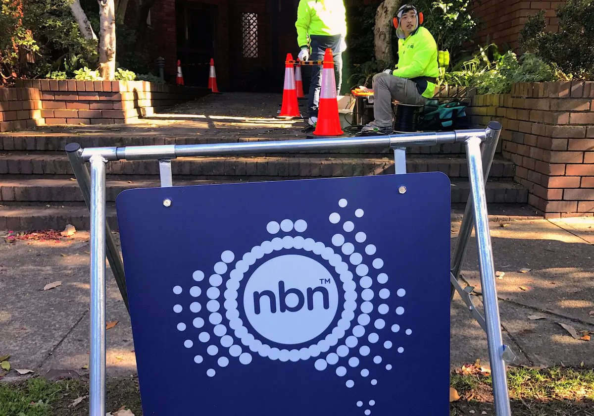 Workers install cables for the Australian National Broadband Network (NBN) at an apartment block in Sydney, Australia, May 30, 2017. (Reuters/David Gray /File Photo)