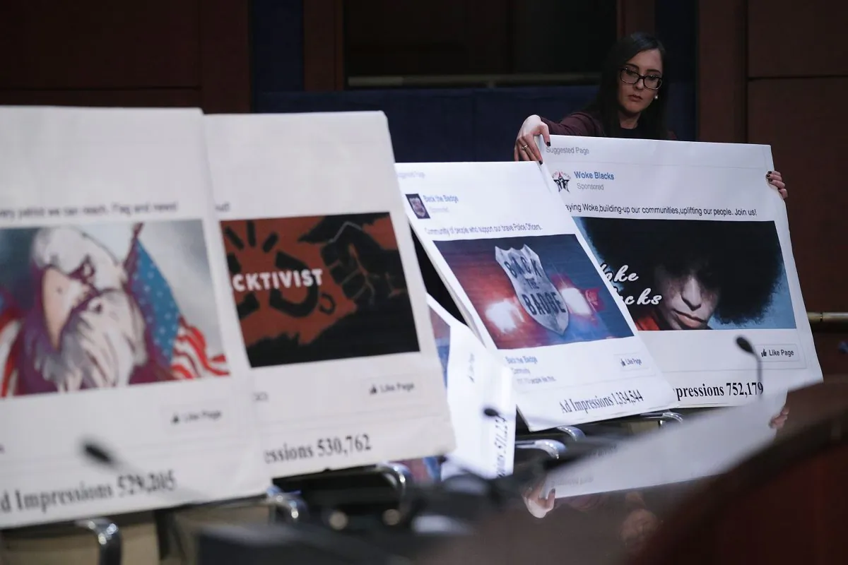 A congressional staff member displays a print out of social media posts during a hearing before the House Select Intelligence Committee on Capitol Hill in Washington, D.C. on Nov. 1, 2017. The committee held a hearing on 'Russia Investigative Task Force: Social Media Companies.' (Alex Wong/Getty Images)