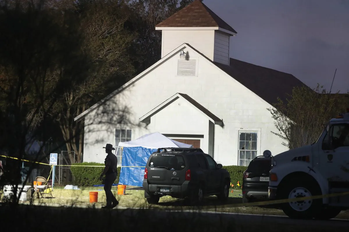Law enforcement officials continue their investigation at First Baptist Church of Sutherland Springs as the sun begins to rise in Sutherland Springs, Texas, on Nov. 6, 2017. (Scott Olson/Getty Images)