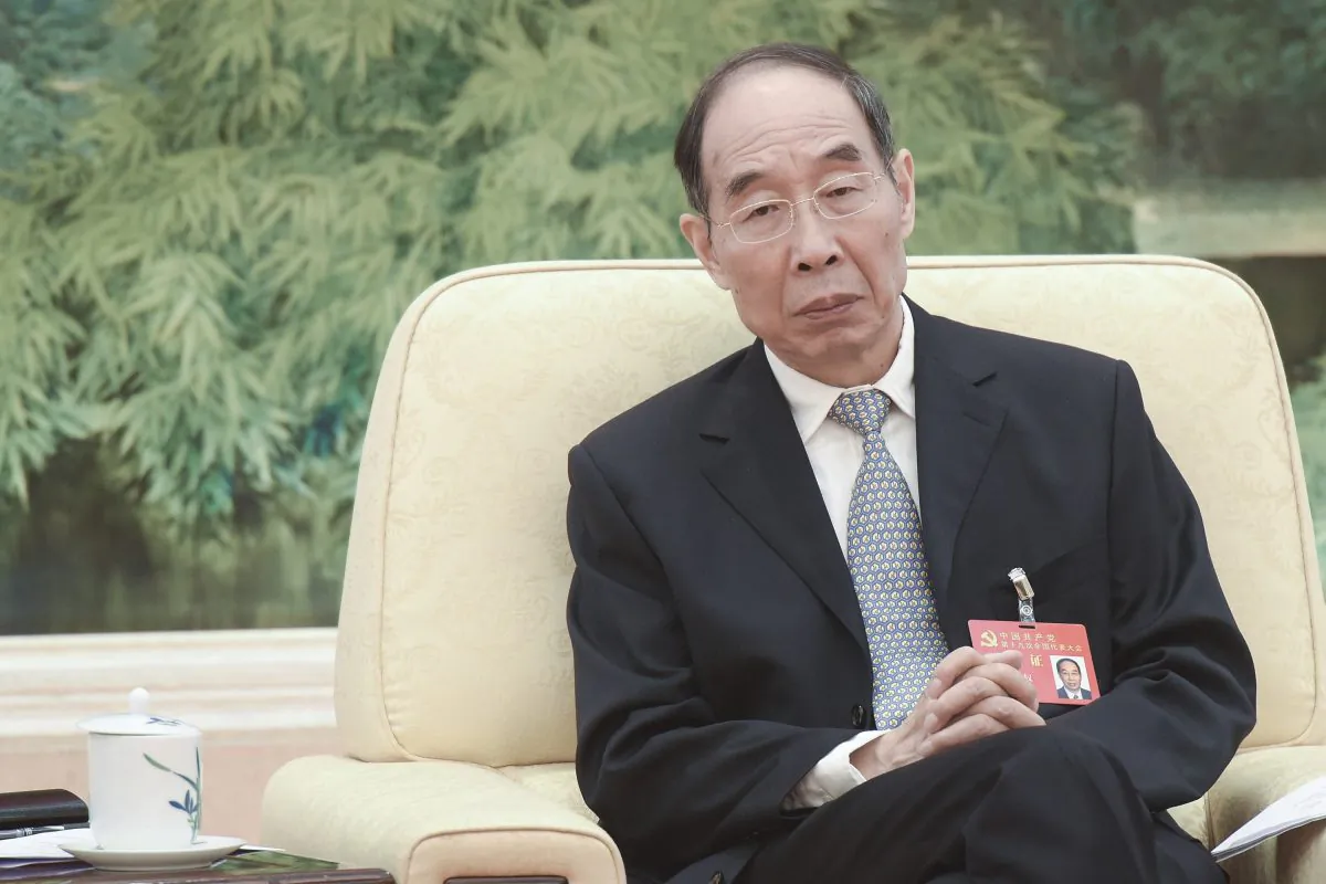New head of the Chinese Communist Party's United Front Work Department, You Quan, attends a meeting at the 19th National Congress at the Great Hall of the People in Beijing, China on October 19, 2017. (Etienne Oliveau/Getty Images)