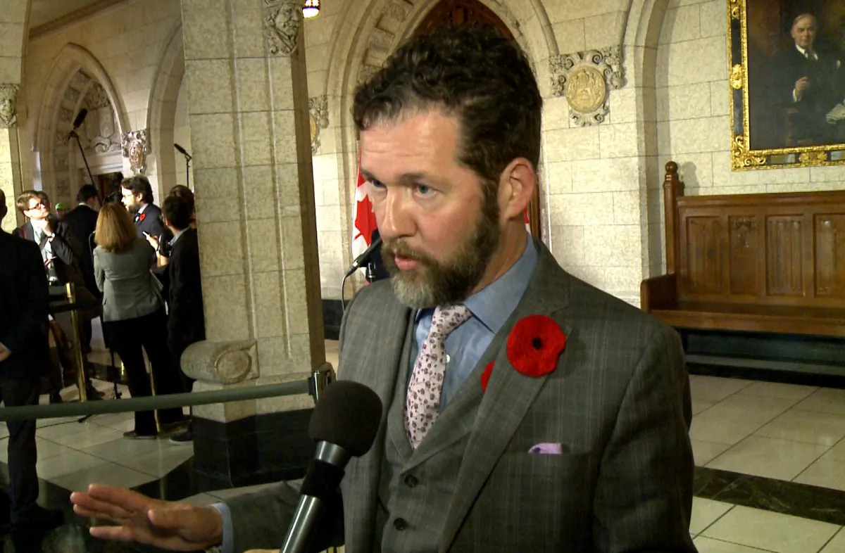 Conservative MP Scott Reid in  the foyer outside the House of Commons on Nov. 7, 2017. (NTD Television)