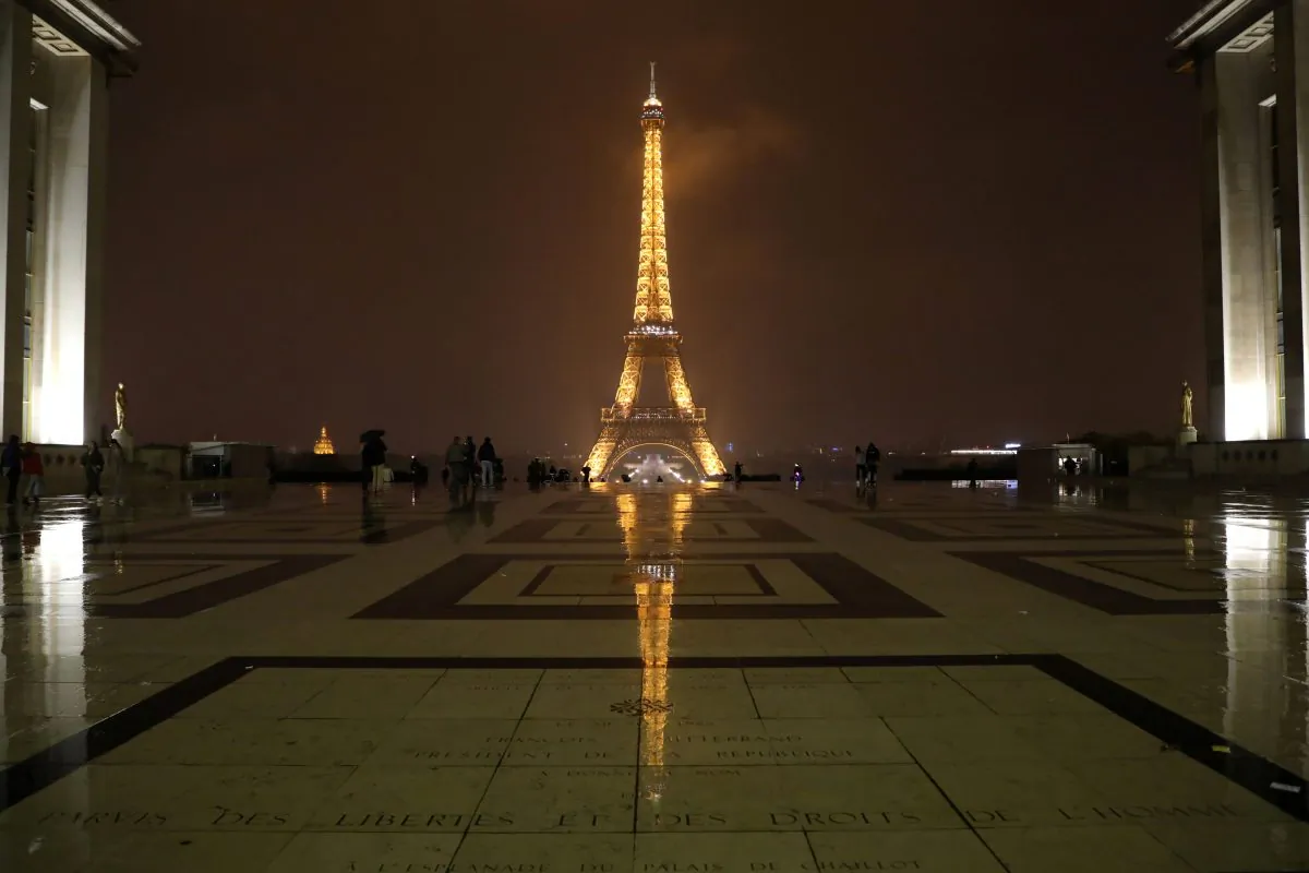 The Eiffel Tower is pictured in Paris before switching off lights on Oct. 2, 2017, in tribute to the victims of the attacks in Las Vegas and Marseille. On Oct. 1, a man knifed two young women to death outside the main train station in Marseille, France's second-biggest city. The ISIS terror group claimed responsibility for the attack via the jihadists' propaganda outlet Amaq, which said was carried out by its "soldiers". It did not provide any evidence for either claim. (LUDOVIC MARIN/AFP/Getty Images)