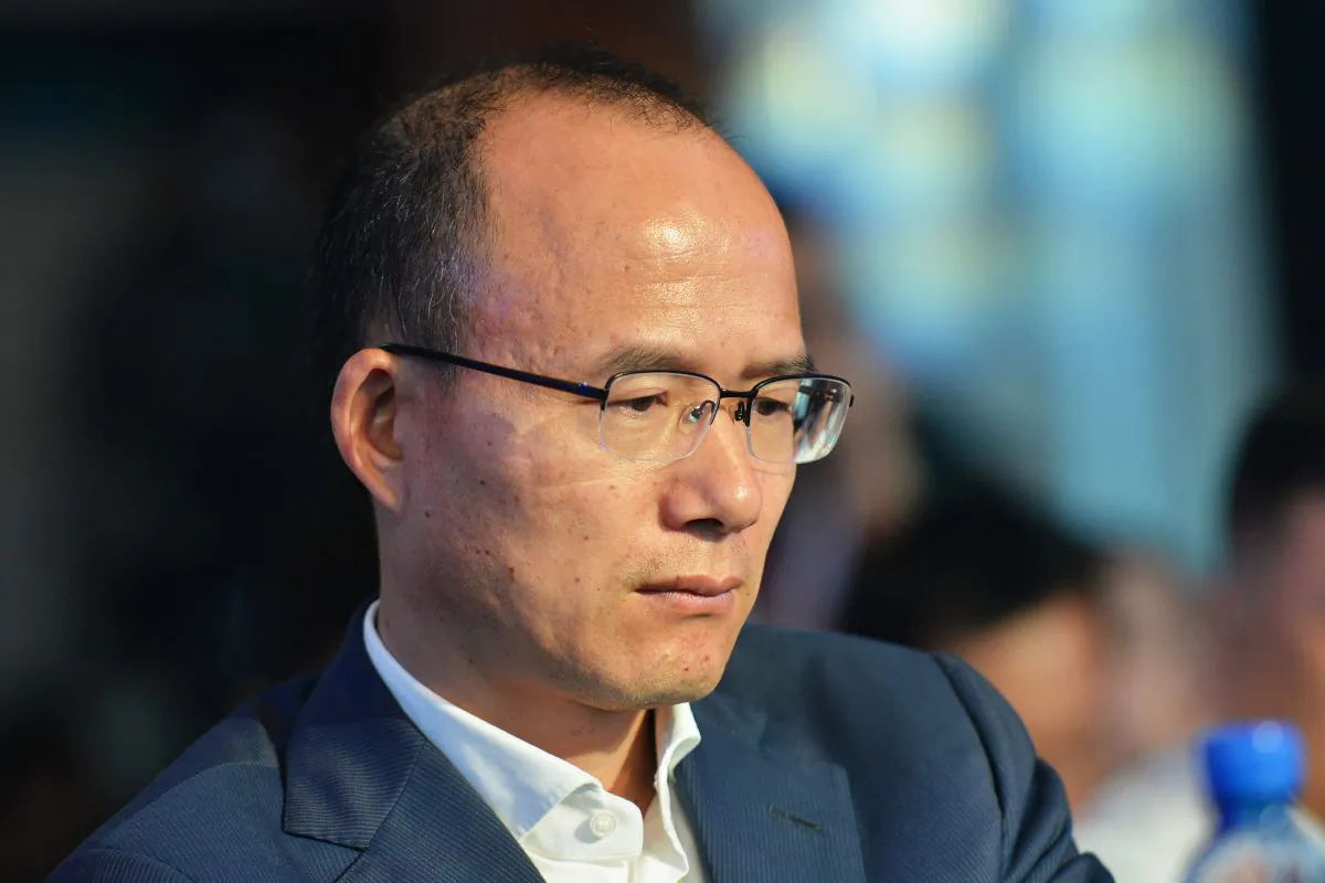 Guo Guangchang, the chairman of Fosun International, one of China's biggest private-sector conglomerates, attends a conference in Hangzhou City, Zhejiang Province in eastern China on June 25, 2015. He recently announced that he would resign from his position at a Fosun subsidiary. (STR/AFP/Getty Images)