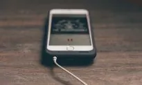 Girl, 14, Electrocuted by Phone Charger in Her Sleep