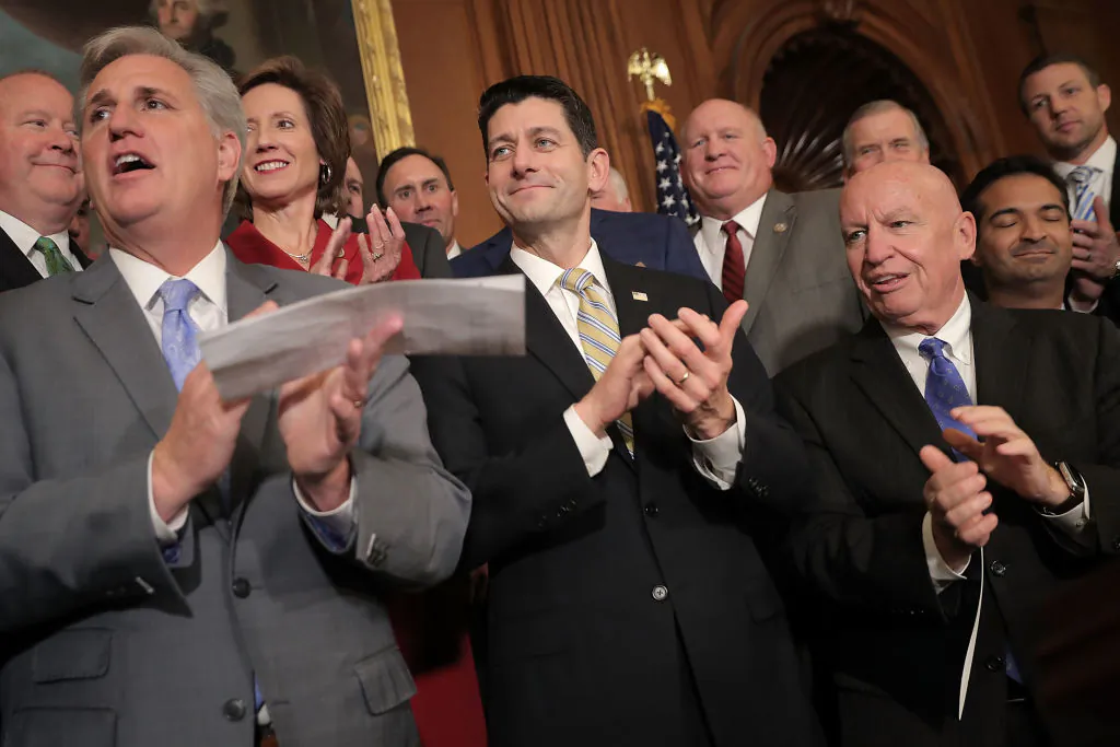 Speaker of the House Paul Ryan (R-Wis.) is joined by fellow House Republicans for a news conference following the passage of the Tax Cuts and Jobs Act in the Rayburn Room at the U.S. Capitol in Washington on Nov. 16, 2017. The House passed the tax reform legislation, moving them one step closer to a promised tax cut before the end of the year. (Chip Somodevilla/Getty Images)