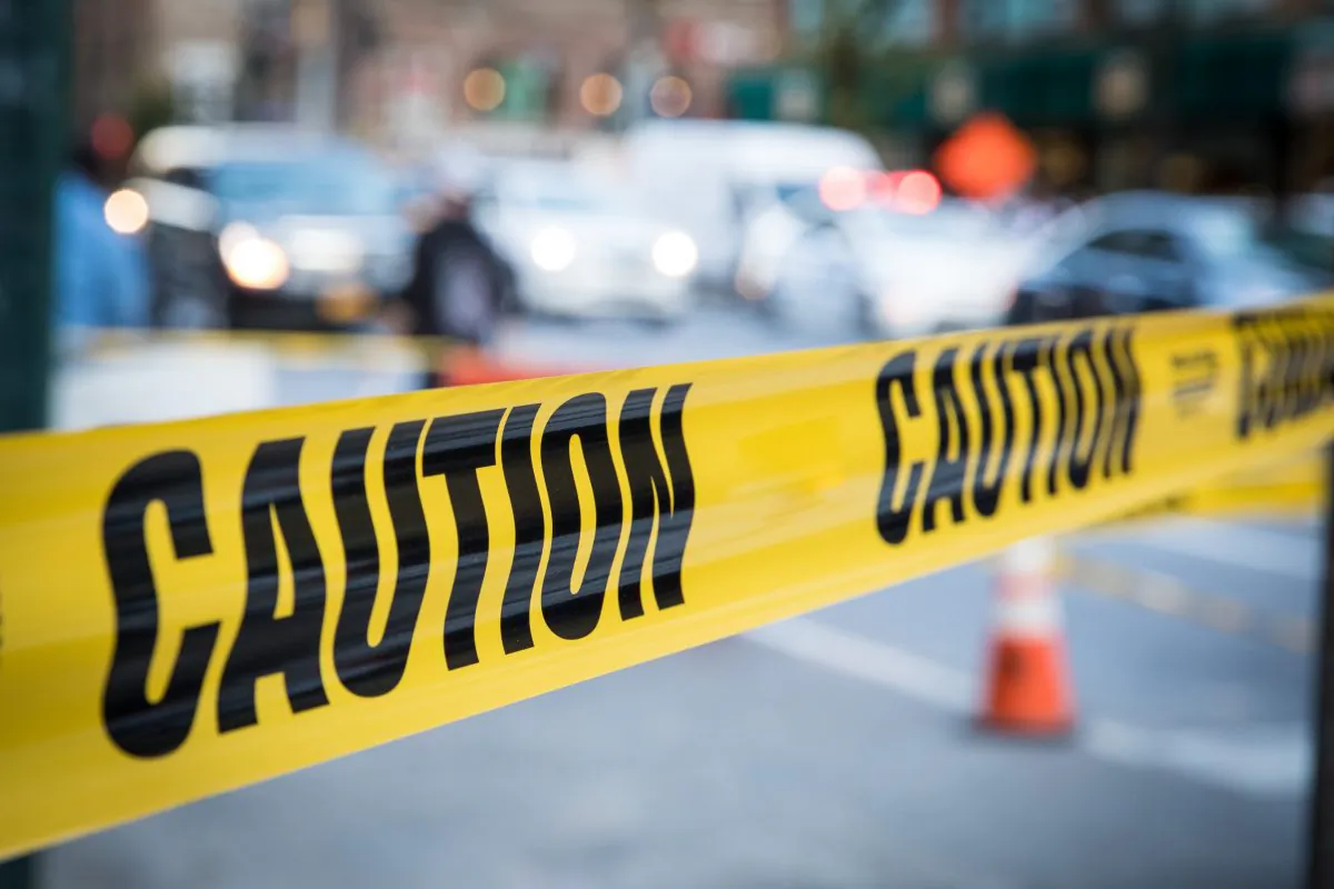Police tape in a file photo. (Benjamin Chasteen/The Epoch Times)