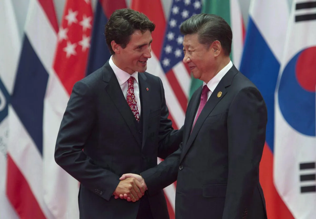 Canadian Prime Minister Justin Trudeau is greeted by Chinese leader Xi Jinping at the G20 Leaders Summit in Hangzhou, China on Sept. 4, 2016. A sweeping federal report shows that Canadian businesses aren't sure a free trade pact will solve all the concerns they have about dealing with the Asian giant. (The Canadian Press/Adrian Wyld)