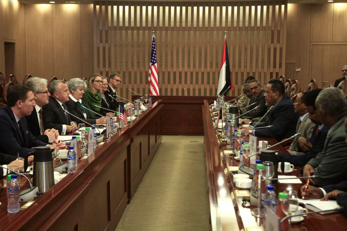 US Deputy Secretary of State John Sullivan (3rd-L) meets with Sudanese Foreign Minister Ibrahim Ghandour (4th-R) at the foreign ministry headquarters in the capital Khartoum on Nov. 16, 2017. Sullivan is the highest ranking official from US President Donald Trump's administration to visit Khartoum since Washington lifted its embargo on Oct. 12, he began his two-day visit aimed at discussing a range of issues, including human rights and religious freedom in the African country. (EBRAHIM HAMID/AFP/Getty Images)