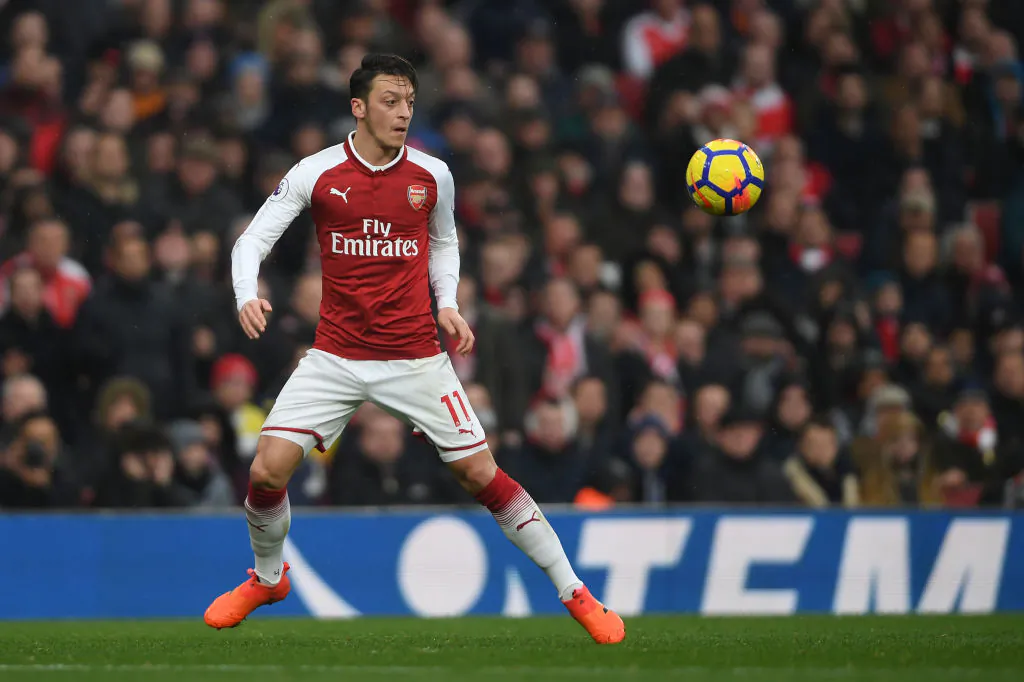Mesut Ozil of Arsenal in action during the Premier League match between Arsenal and Tottenham Hotspur at Emirates Stadium on Nov 18, 2017 in London, England.  (Mike Hewitt/Getty Images)