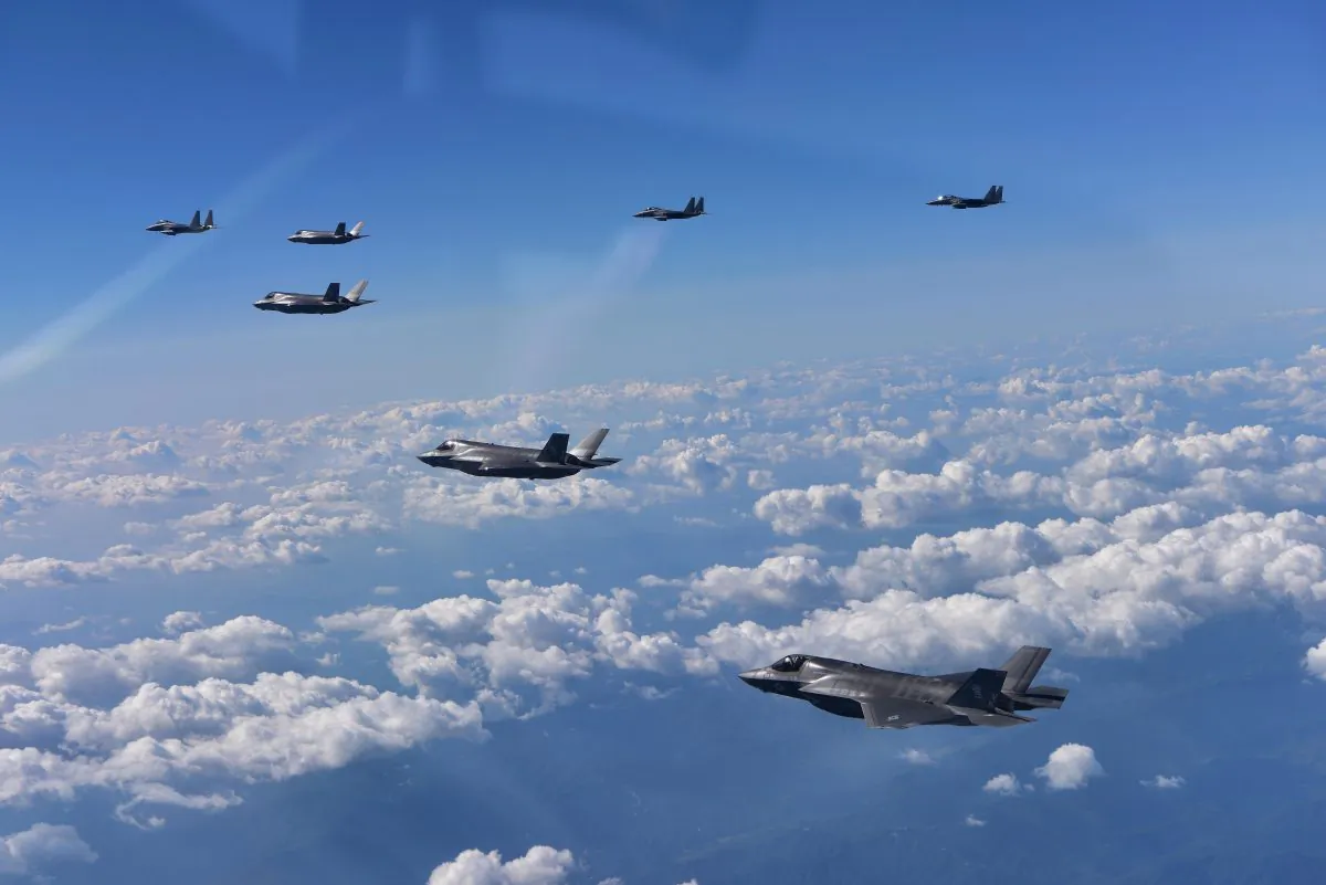 South Korea's F-15K fighter jets and U.S. marine's F-35B fly over the Korean Peninsula during a training in Gangwon-do, South Korea, on Aug. 31, 2017. (Handout/South Korean Defense Ministry via Getty Images)