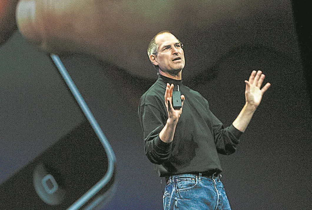Apple CEO Steve Jobs unveils the first iPhone at the Macworld developers conference in San Francisco on Jan. 9, 2007. Since then, Apple and other innovative companies have developed hundreds of different models, constantly improving the user experience. (TONY AVELAR/AFP/GETTY IMAGES)