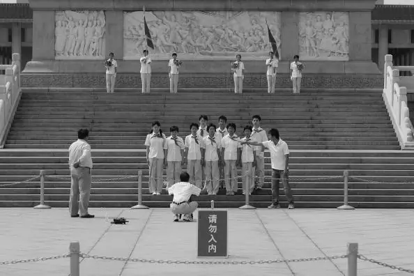 Members of the Chinese Communist Youth league stand at the Monument to the People's Heroes at Tiananmen Square in Beijing on June 4, 2007. (Guang Niu/Getty Images)