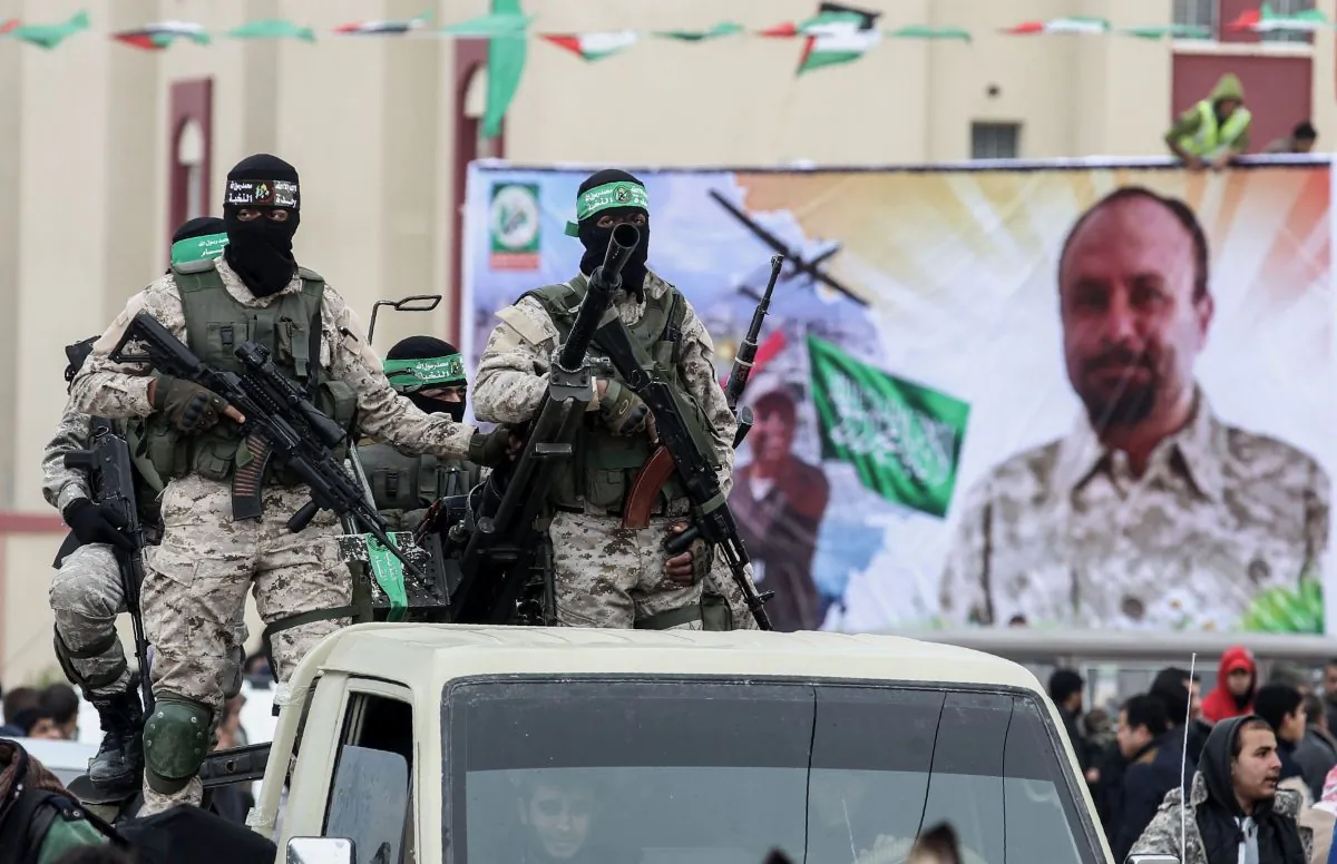 Members of the Izzedine al-Qassam Brigades, the military wing of the Palestinian Islamic terrorist group Hamas, attend a memorial in the Gaza Strip on Jan. 31, 2017. (Said Khatib/AFP/Getty Images)