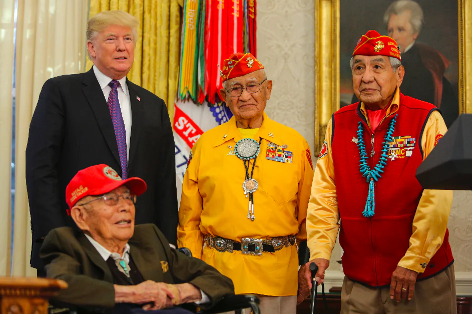 (L-R) President Donald Trump hosts Fleming Begaye, Thomas Begay, and Peter MacDonald, Navajo Code Talkers from World War II, in the Oval Office at the White House on Nov. 27. (Oliver Contreras-Pool/Getty Images)