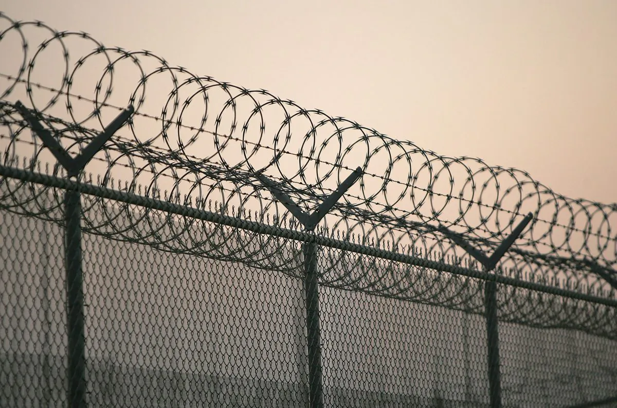 The fence at the County Detention and Correctional Facility is pictured during sunset in Santa Barbara, California. (David McNew/Getty Images)