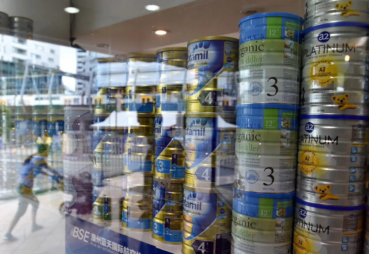 A shop window displaying tins of baby milk formula in Sydney on Feb. 16, 2016. (Saeed Khan/AFP/Getty Images)