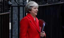 May Heads for Brussels as Last-Minute Brexit Talks Go On