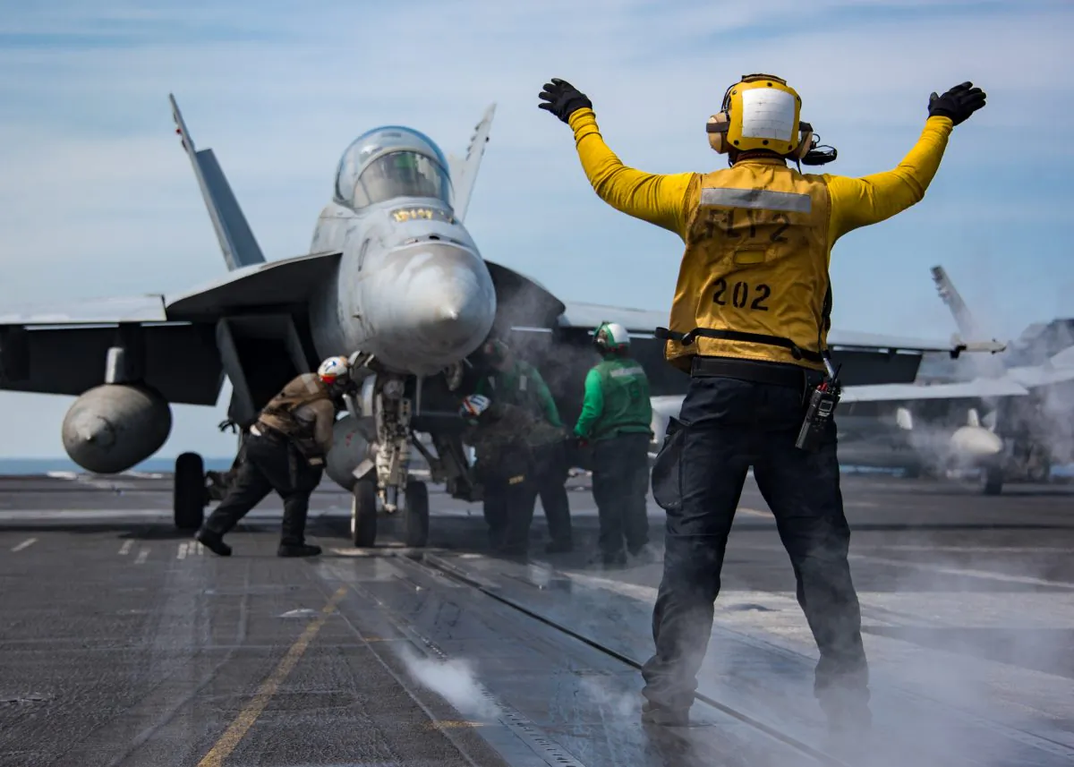 U.S. Navy sailors conduct flight operations aboard the Nimitz-class aircraft carrier USS Carl Vinson (CVN 70) in the western Pacific Ocean on May 2, 2017. (Sean M. Castellano/US Navy via Getty Images)