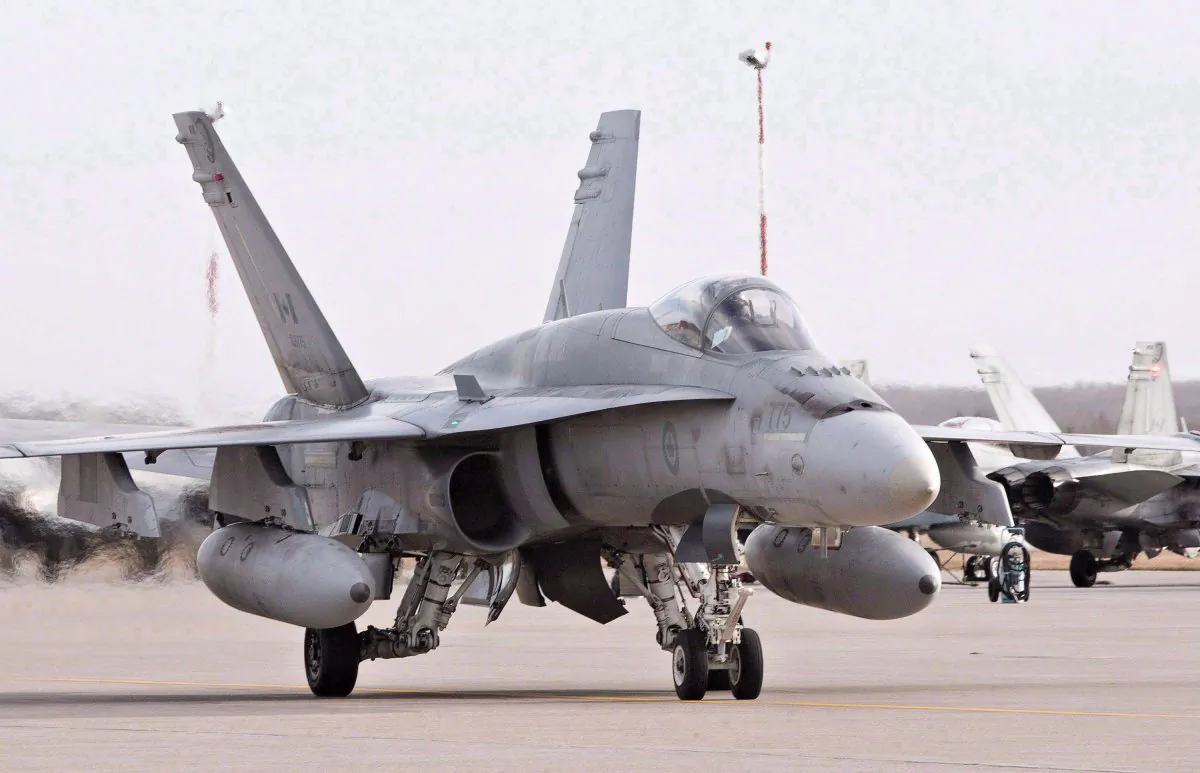 A pilot positions a CF-18 Hornet at the CFB Cold Lake in Cold Lake, Alberta, on Oct. 21, 2014. (The Canadian Press/Jason Franson)
