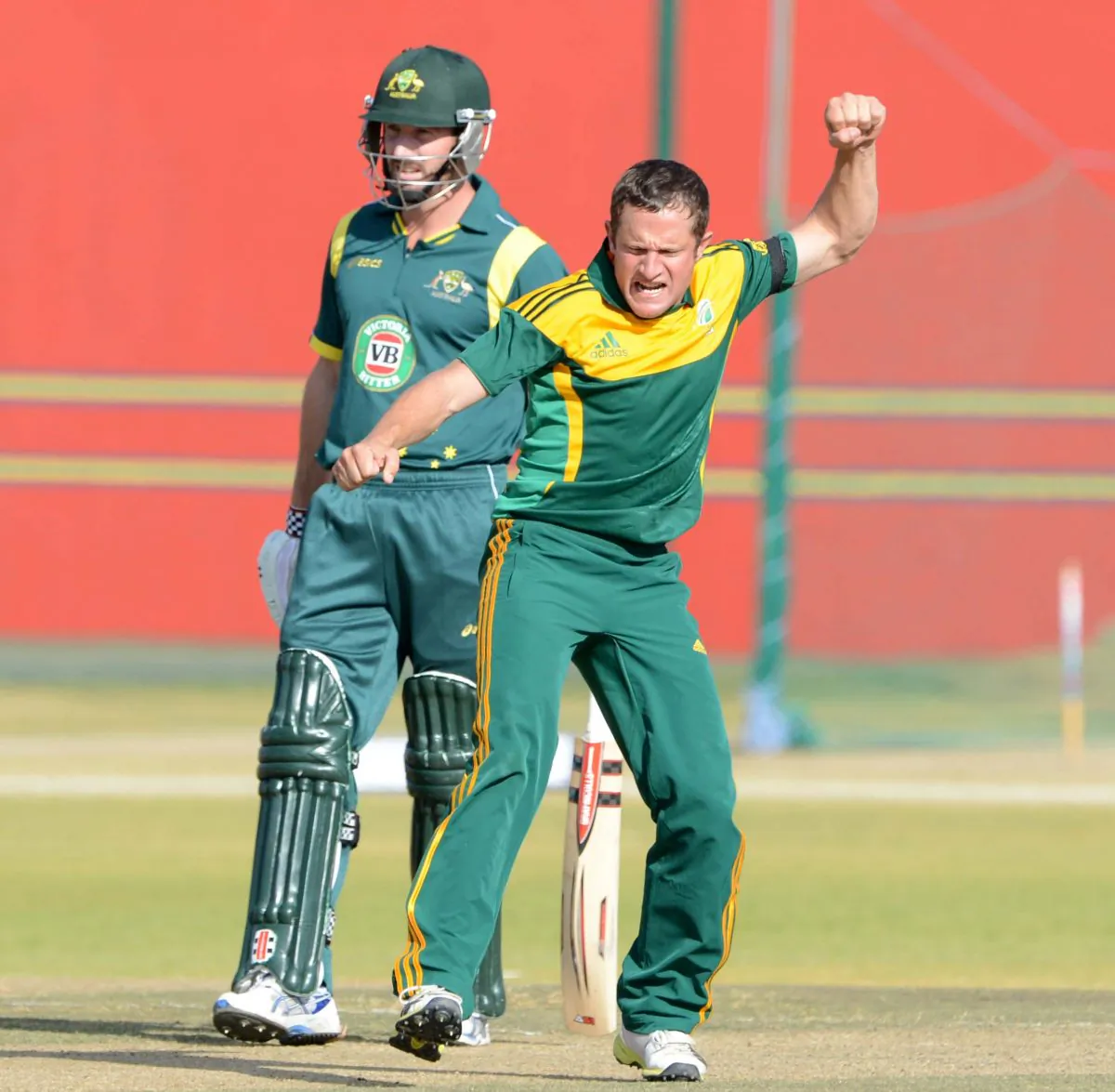 PRETORIA, SOUTH AFRICA - AUGUST 06: Roelof van der Merwe of South Africa A celebrates the wicket of Moises Henriques of Australia A during the 1st ODI match between South Africa A and Australia A from Tuks Oval on August 06, 2013 in Pretoria, South Africa. (Photo by Lee Warren/Gallo Images/Getty Images)