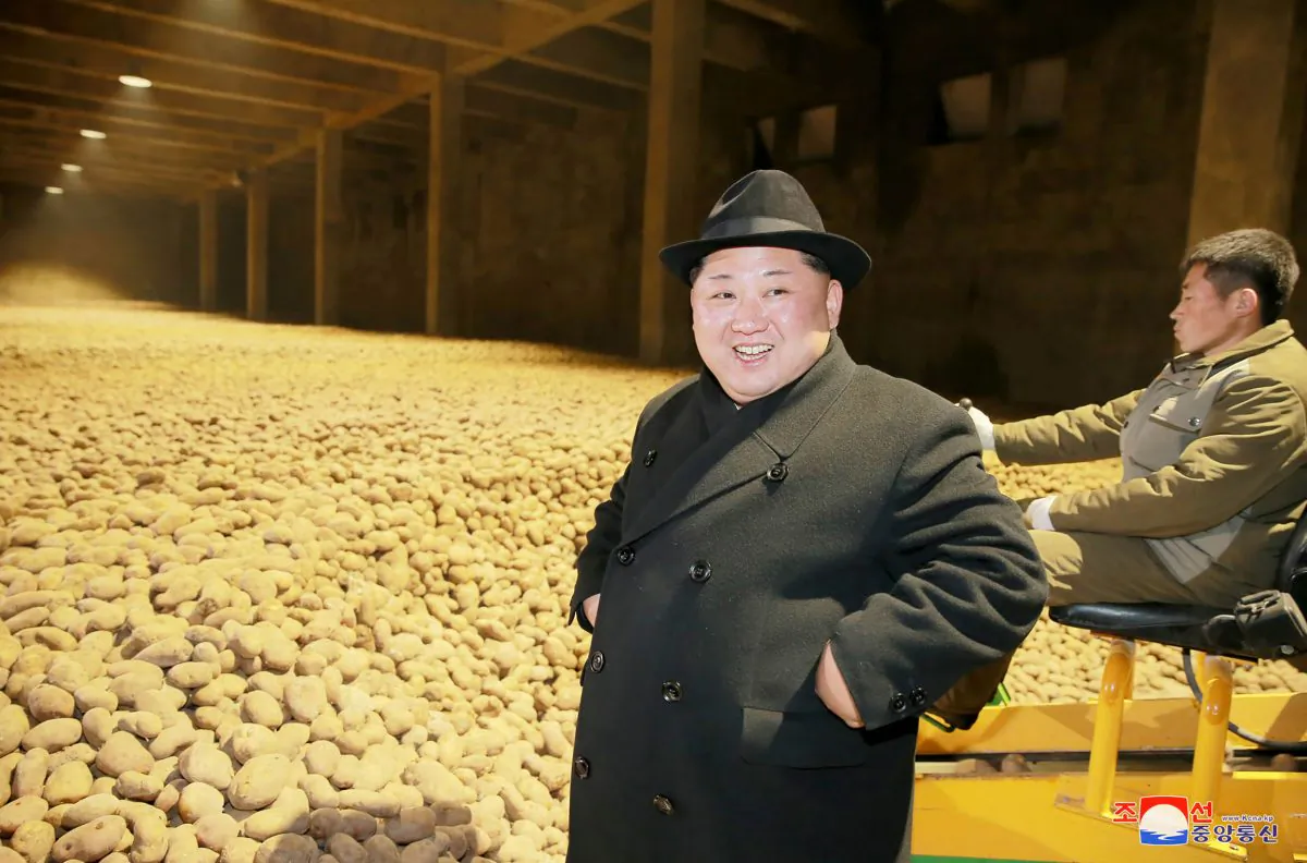 North Korean leader Kim Jong-un (L) inspects the newly-built Samjiyon potato farina production factory in Ryanggang Province, North Korea on Dec. 6, 2017. (STR/AFP/Getty Images)