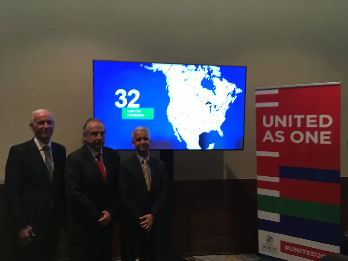 (L-R) Canadian Soccer Association president Steve Reed, Mexican Football Federation president Decio de Maria, and Sunil Gulati, U.S. soccer president pose for photos after a press conference in Toronto on Dec. 9, 2017. (Rahul Vaidyanath/The Epoch Times)