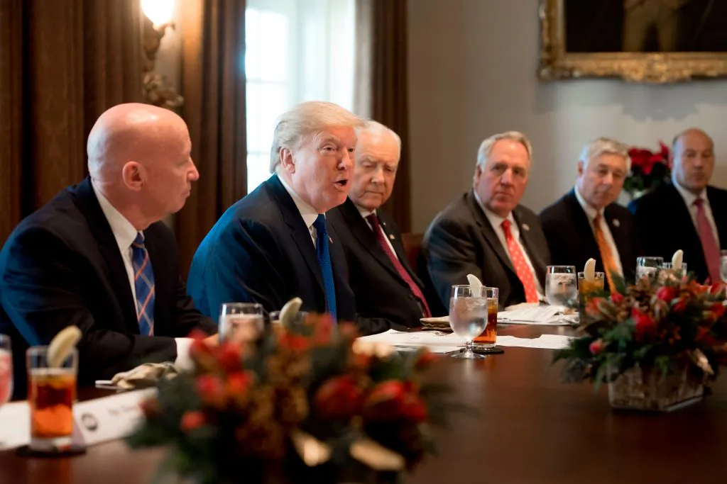 US President Donald Trump speaks about tax reform legislation during a lunch with lawmakers working on the tax reform conference committee in the Cabinet Room at the White House in Washington, DC, Dec. 13, 2017. (SAUL LOEB/AFP/Getty Images)