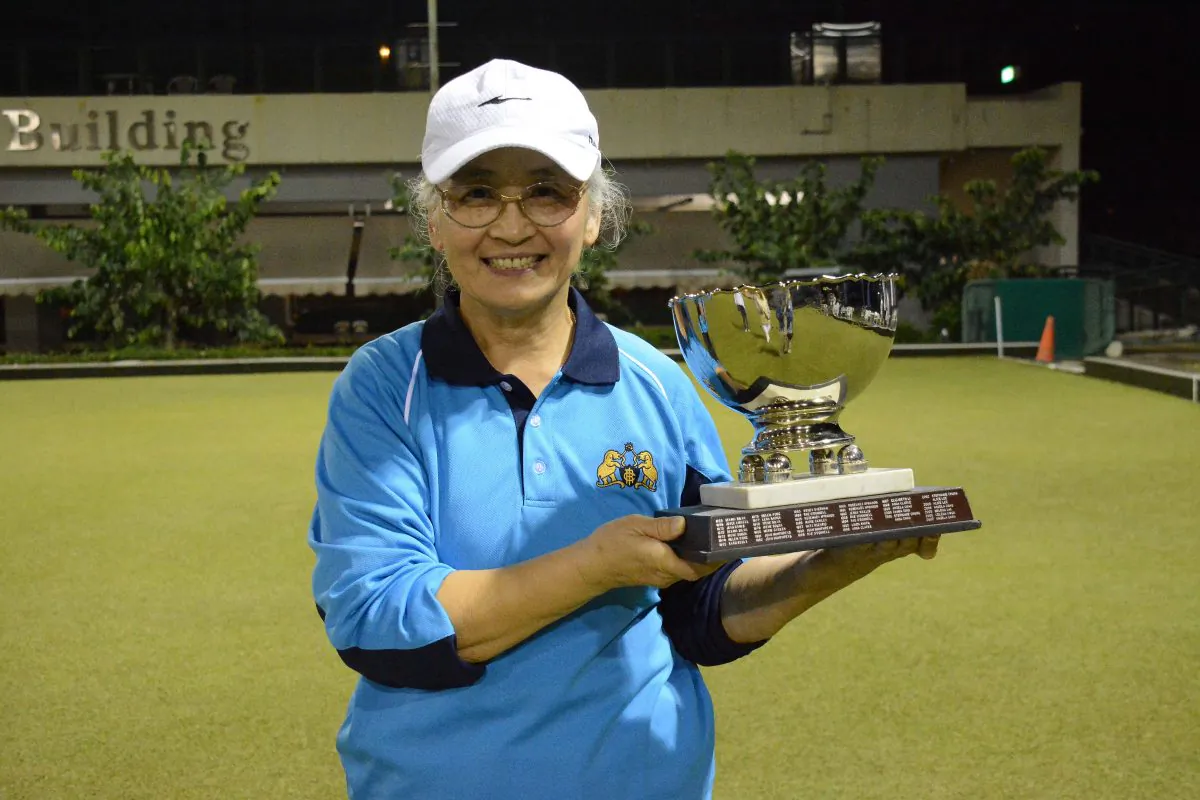 Shirley Ko of Indian Recreation Club proudly displays her Women’s Knockout Singles trophy after defeating Gloria Ha from the Hong Kong Youth Team on Sunday evening Dec 10, 2017. (Stephanie Worth)