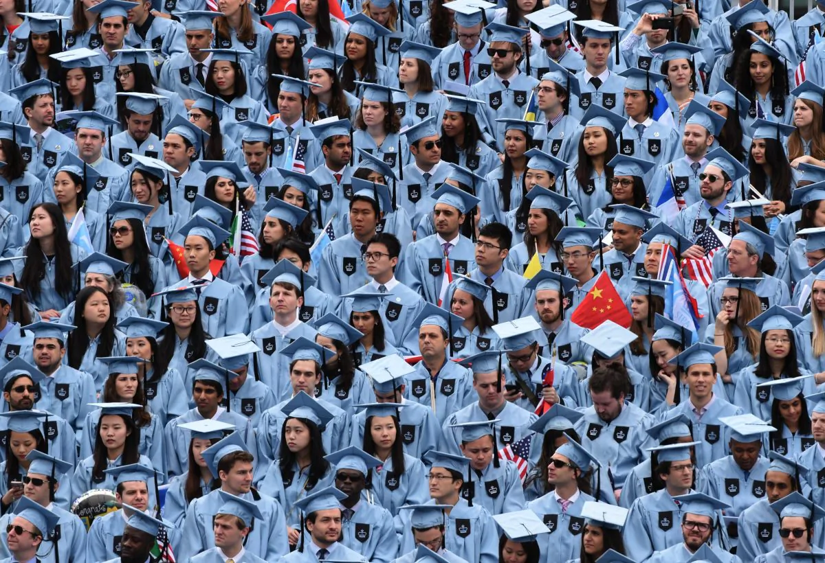 Graduating students attend the Columbia University 2016 Commencement ceremony in New York May 18, 2016. / AFP / TIMOTHY A. CLARY (Photo credit should read TIMOTHY A. CLARY/AFP/Getty Images)
