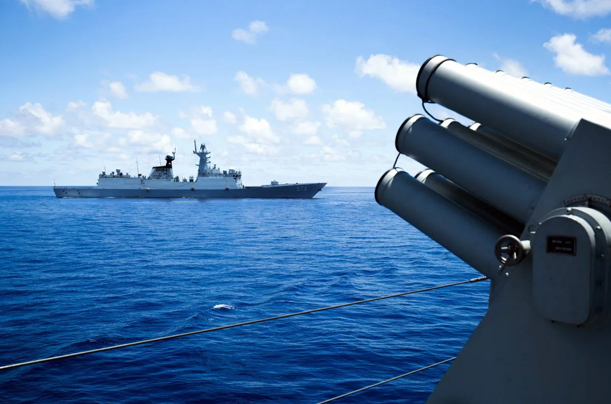 Vessels of China's South Sea Fleet taking part in a logistics supply drill near the James Shoal area on South China Sea on May 10, 2016. The Chinese regime claims sovereignty over almost the whole of the South China Sea, pitting it against several neighbors in the region. (STR/AFP/Getty Images)