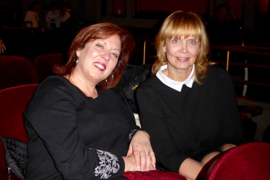 (L to R)Christina Shortt and Karen Kalriess, an administrator at St. John's University in New York, enjoy Shen Yun Performing Arts at the Palace Theater on Dec. 22, 2017. (Frank Liang/The Epoch Times)