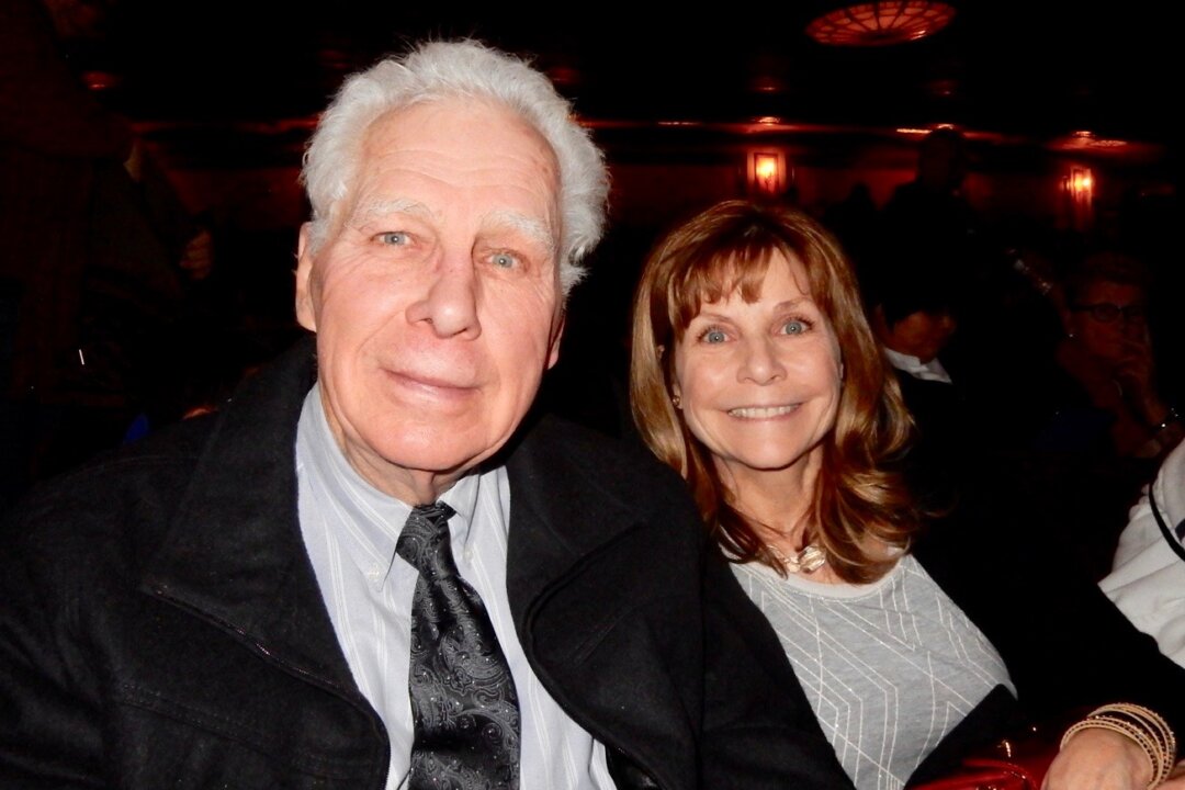 Dr. Andrew Keene and his wife, Lynn, enjoy Shen Yun Performing Arts at the Palace Theater, on Dec. 22, 2017. (Weiyong Zhu/The Epoch Times)