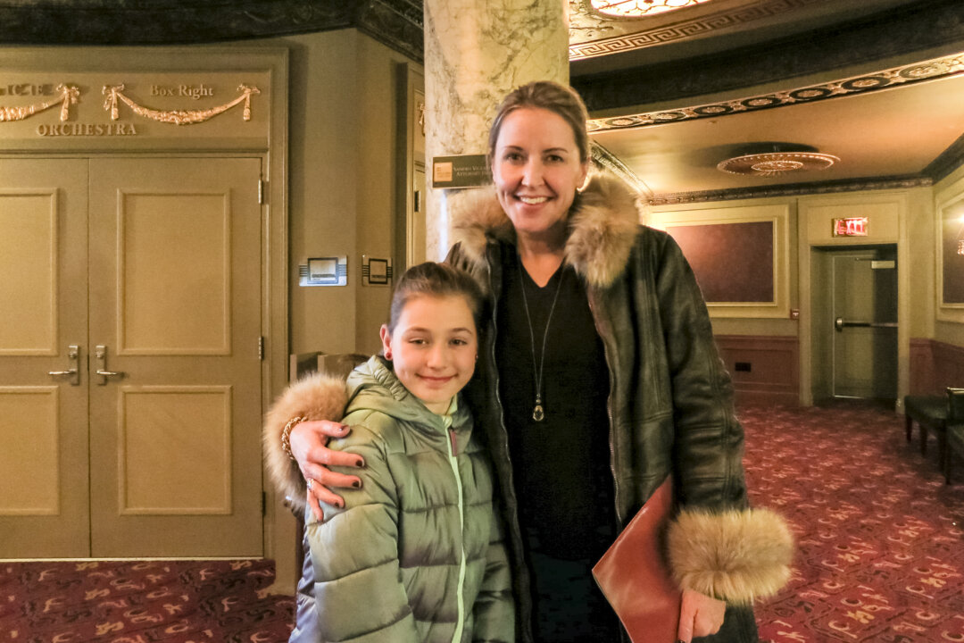 Molly Cottingham and her daughter enjoyed watching a performance by the Shen Yun Performing Arts at Palace Theater in Waterbury, Connecticut, on Dec. 22, 2017. (Sally Sun/The Epoch Times)
