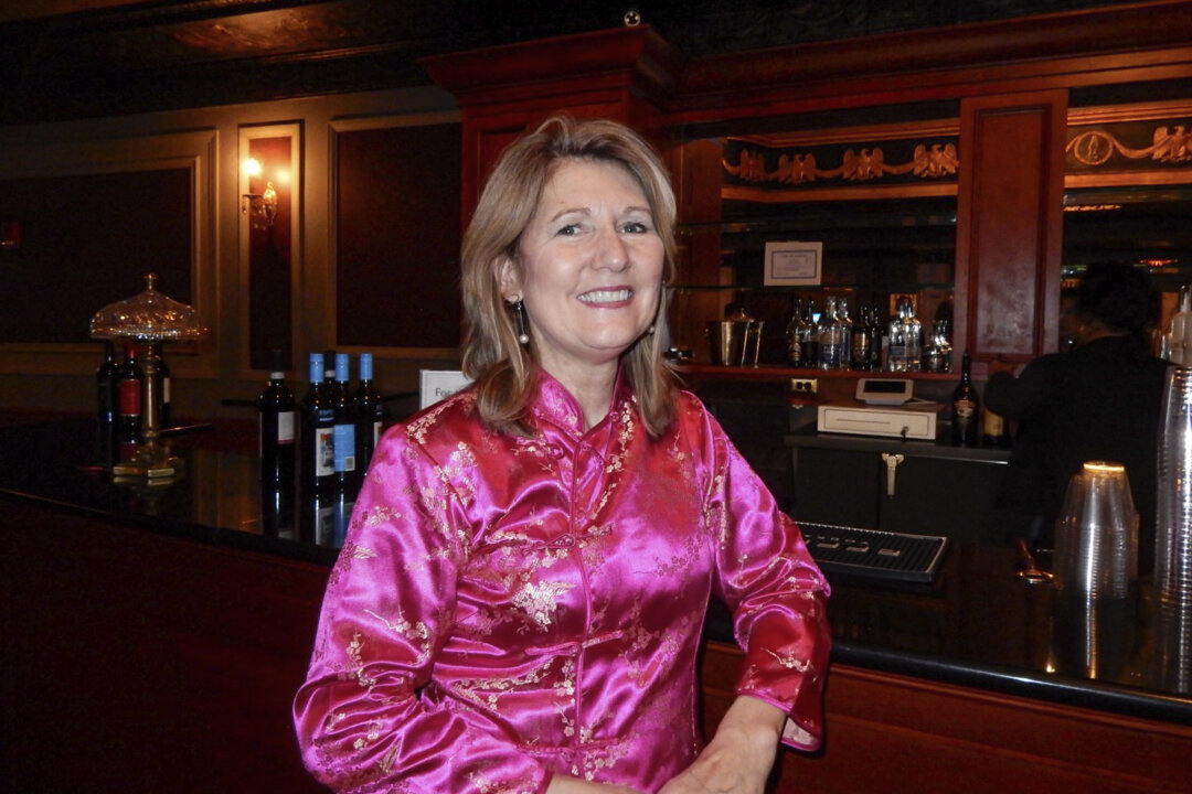 Kathleen Kiley enjoyed watching a performance by the Shen Yun Performing Arts at the Palace Theater in Waterbury, Connecticut, on Dec. 23, 2017. (Weiyong Zhu/The Epoch Times)