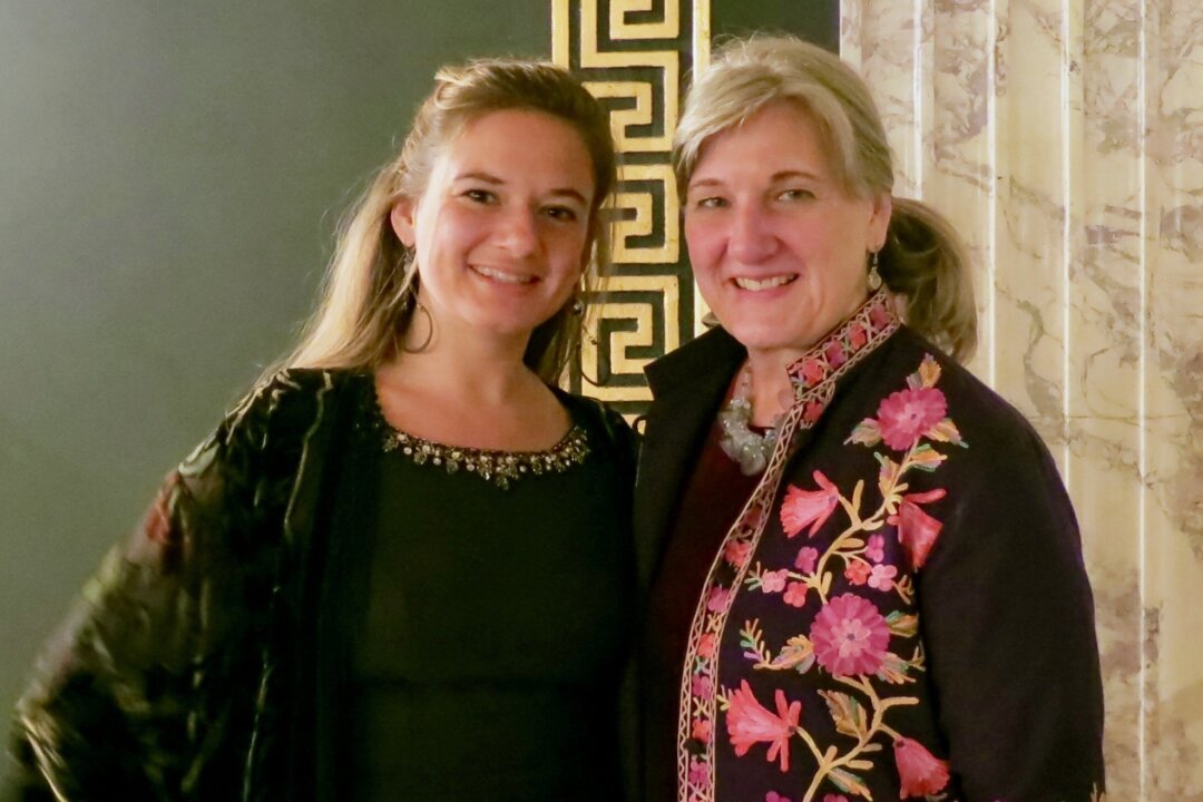 Heather Dowling and her mother Su Slover enjoyed watching a performance by the Shen Yun Performing Arts at Palace Theater in Waterbury, Connecticut, on Dec. 23, 2017. (Sally Sun/The Epoch Times) 