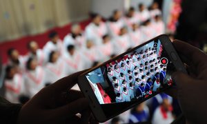 On Christmas Eve, Chinese Regime Topples Christmas Trees and Spies on Christians