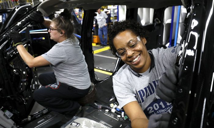 Ford workers at the assembly line at the Ford Kentucky Truck Plant in Louisville, Kentucky, on Oct. 27 2017. (Bill Pugliano/Getty Images)