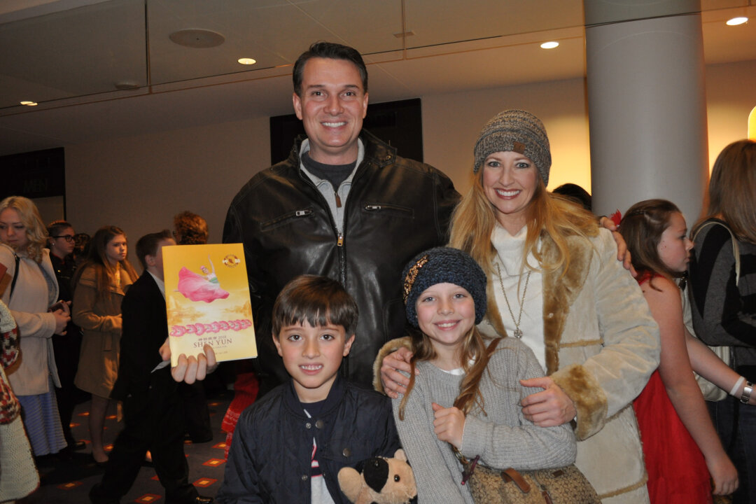 Wallace and Christie Hattenhauer, their daughter Blaine Hattenhauer and son Brad Hattenhauer, enjoyed a performance by Shen Yun Performing Arts at the Robinson Performance Hall, Little Rock, Arkansas, on Jan. 1, 2018. Christie Hattenhauer said the story of the persecution really touched her heart. (Amy Hu/The Epoch Times) 