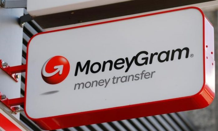 A Moneygram logo is seen outside a bank in Vienna, Austria, June 28, 2016. (Heinz-Peter Bader/Reuters)