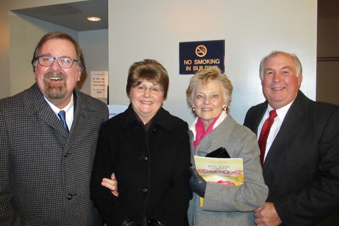 Randy Hickman (R) and his friends enjoyed watching Shen Yun at William B. Bell Auditorium in Augusta, Georgia on Jan. 2, 2018. (Ronald Ree/The Epoch Times)